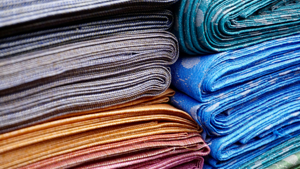 piles of colorful fabric