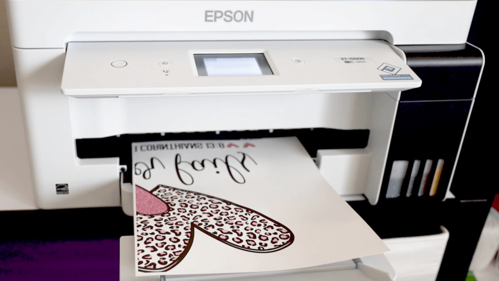 printing the design on the special paper with a sublimation printer